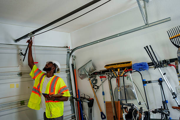 Professional Garage Door Panel Replacement technician working in Linn County County, MO